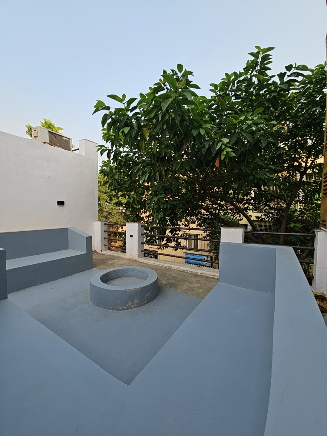Rooftop terrace at The Agra Retreat — relax at sunset with views of Agra and Taj Mahal